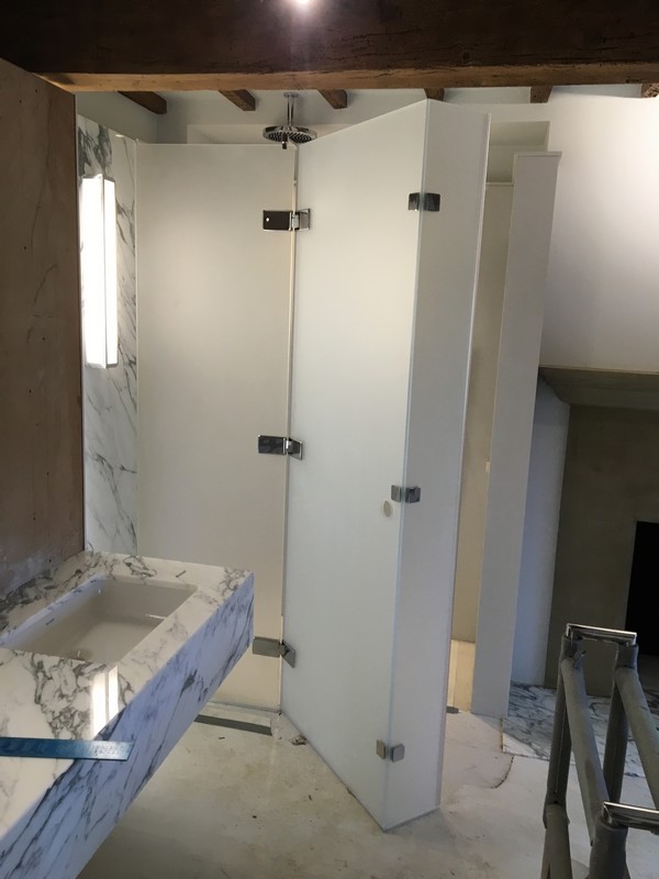 Bespoke frosted glass shower enclosure in Wandsworth luxury bathroom