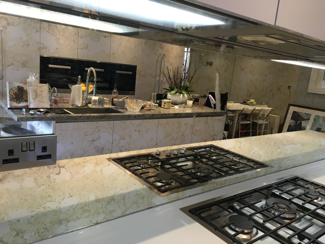 Mirror glass splashback in Wandsworth luxury kitchen